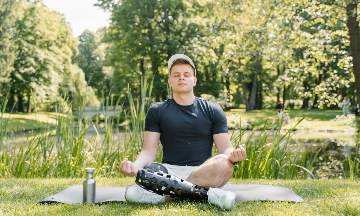  A person meditating in a forest setting — microdosing and mindfulness practice