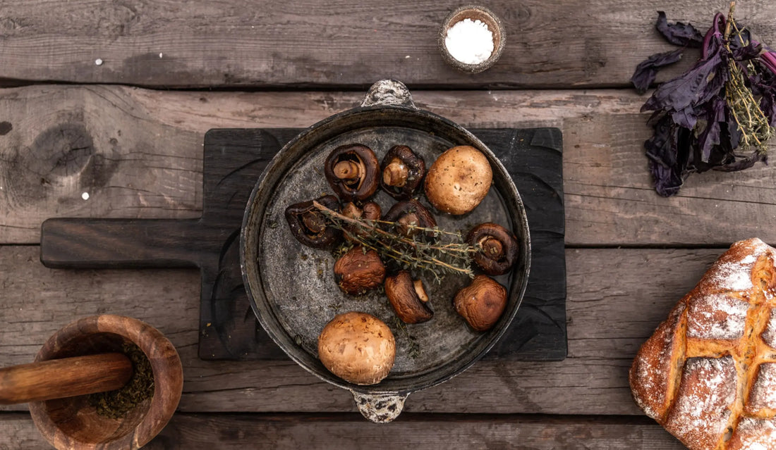 Herbal capsules and functional mushrooms arranged on a wooden surface — Medicine Box microdosing vision