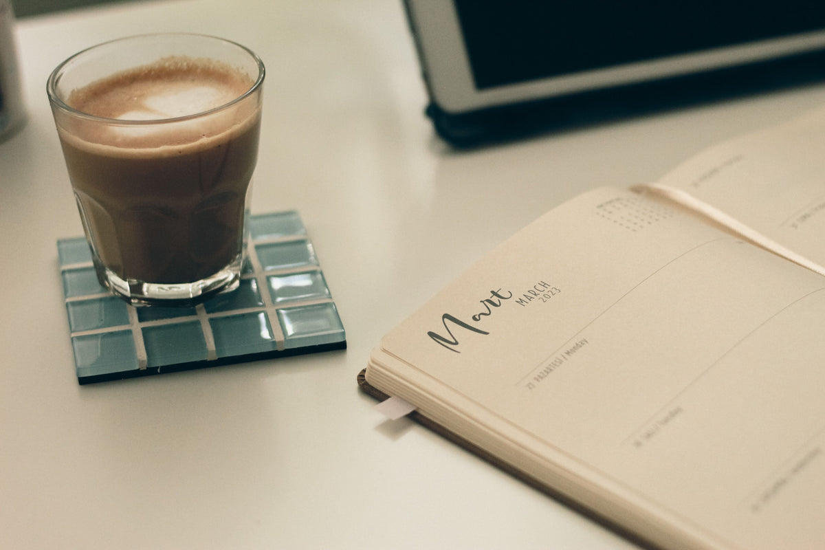 An open planner with a morning wellness routine laid out — how long to microdose for optimal benefits